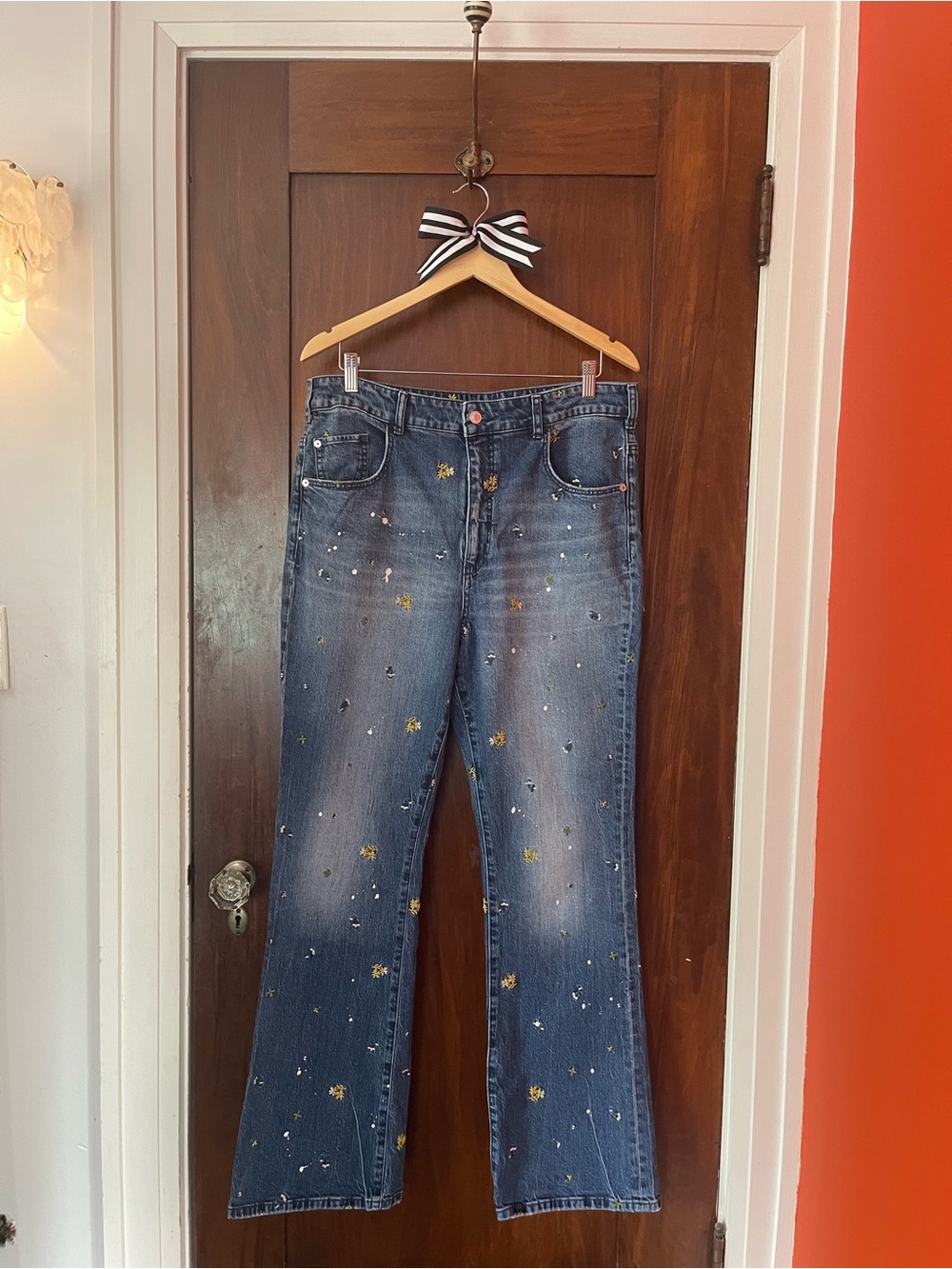 Pilcro Indigo Flare Jeans with Flower Embroidery and Paint Accents